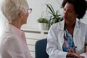 a physician talking to a patient