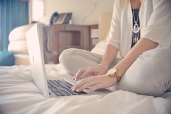 Woman working on a laptop computer